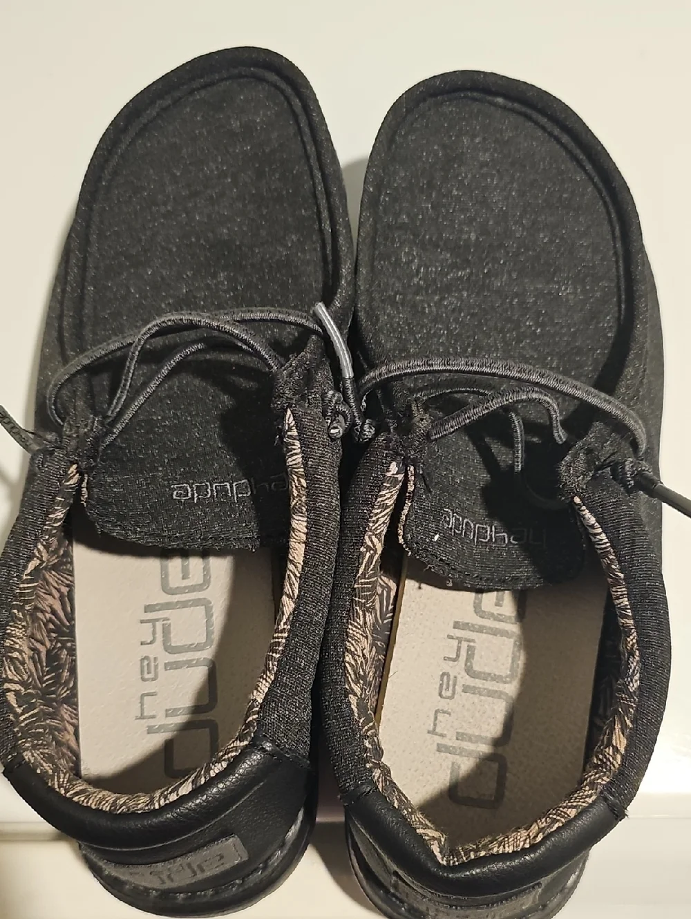 Hey Dude Black Moccasin Slip-Ons with Patterned Collar